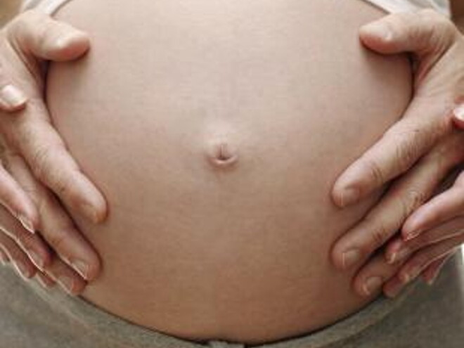 Tummy of pregnant woman