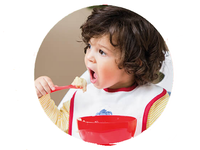 kid eating with spoon